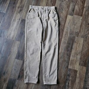 Vintage Woman's Liz Caliborn tan, high-waisted corduroy pants.